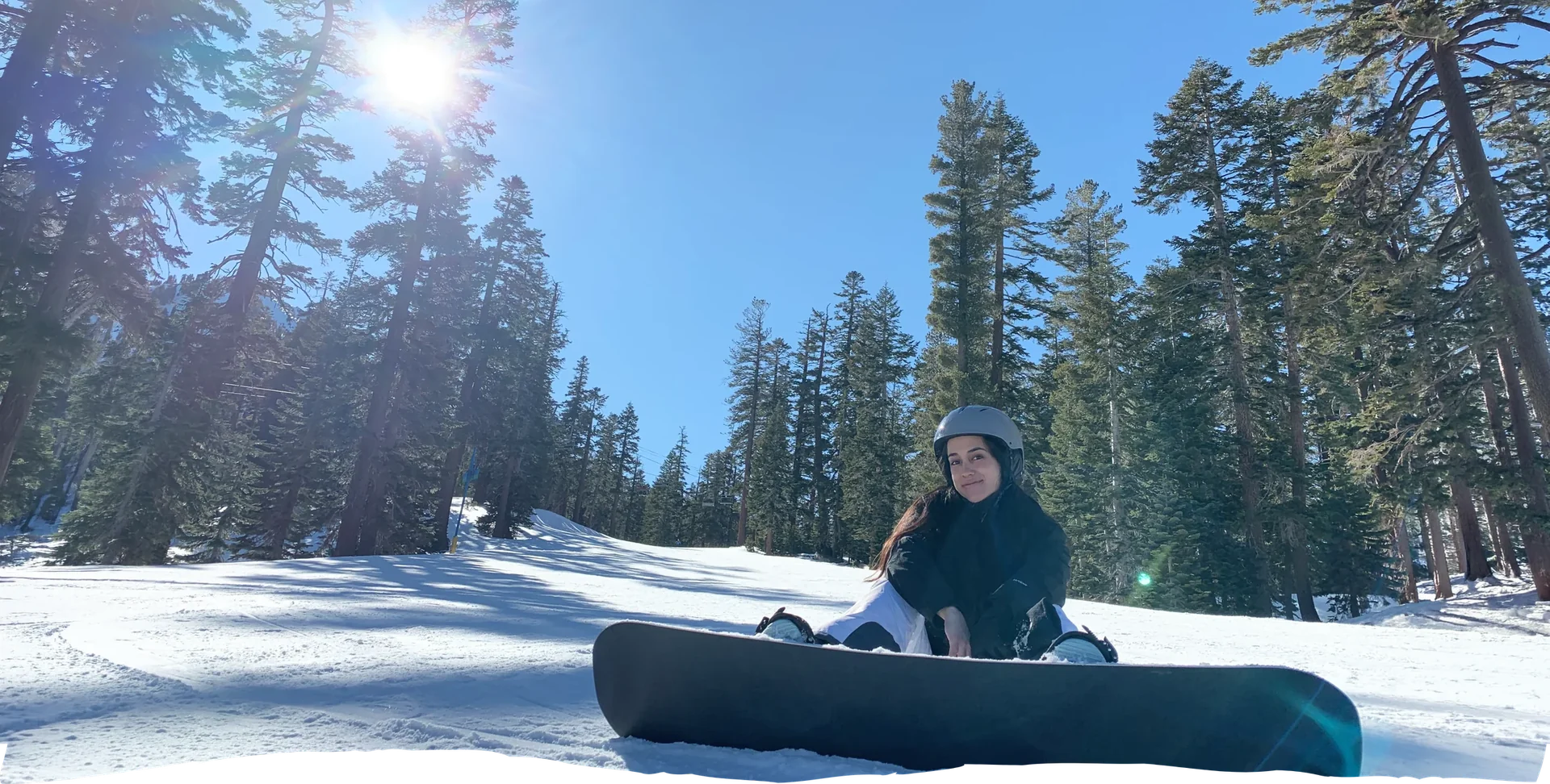 Go Wex participant snowboarding during the winter season